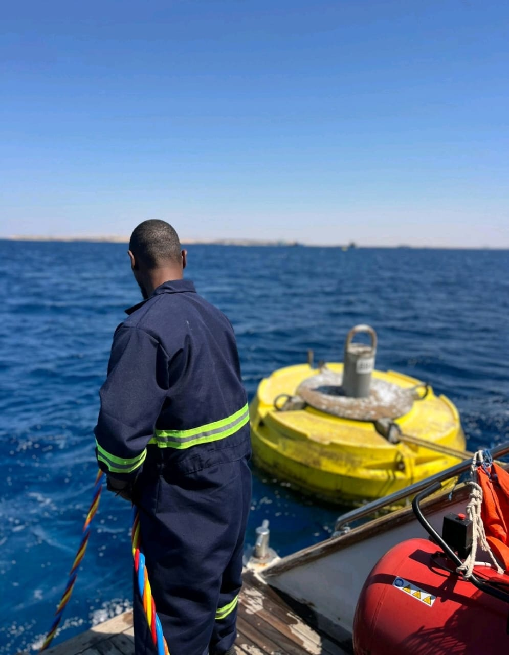 Dive team tendering from the support boat